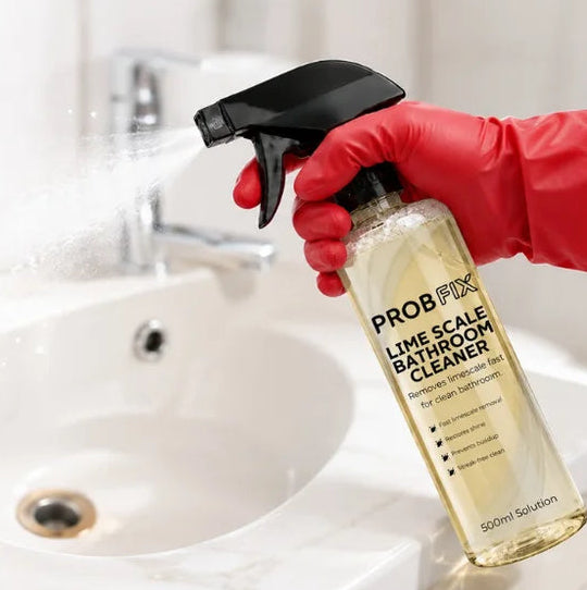 Spraying ProbFix cleaner on a wash basin