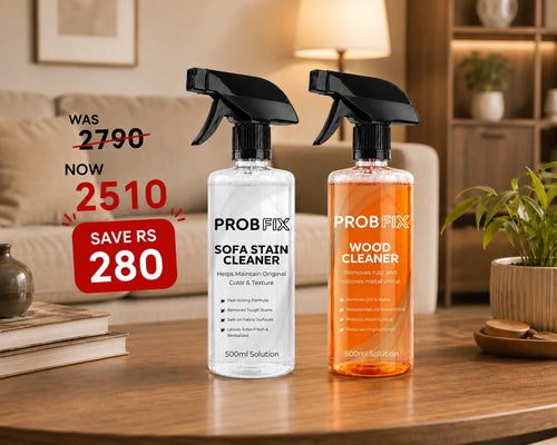 Two Probfix furniture and fabric care cleaner bottles displayed on a tabletop with a blurred indoor background. The bundle includes a white bottle labeled 'Sofa Stain Cleaner' and an orange bottle labeled 'Wood Cleaner,' with a red banner at the bottom reading 'SAVE RS 280' and a blue price overlay showing 'Bundle 2,510/-' crossed out with '2,790.