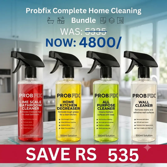 Four spray bottles of PROBFIX home cleaning products displayed together against a blurred kitchen background, with promotional text reading 'Probfix Complete Home Cleaning Bundle' and 'SAVE RS 535'. The bottles contain red, yellow-green, yellow, and clear liquids and are labeled for bathroom, kitchen, all-purpose, and wall cleaning.
