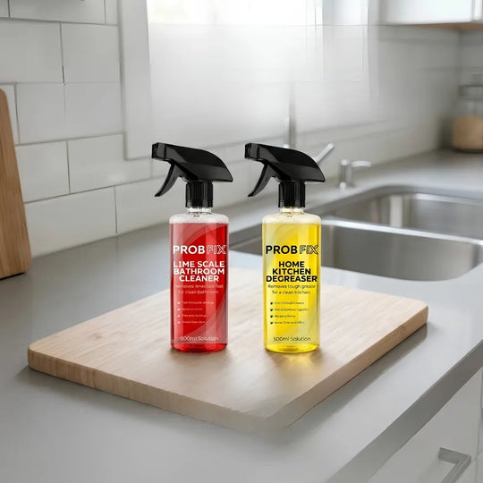Two bottles of ProBfix cleaning products on a kitchen counter.